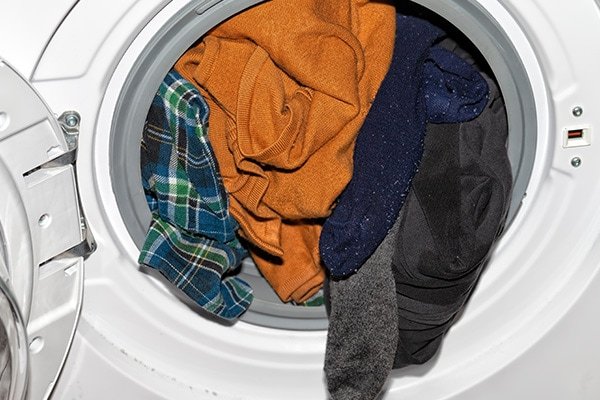 What are the main causes of washing machine not draining